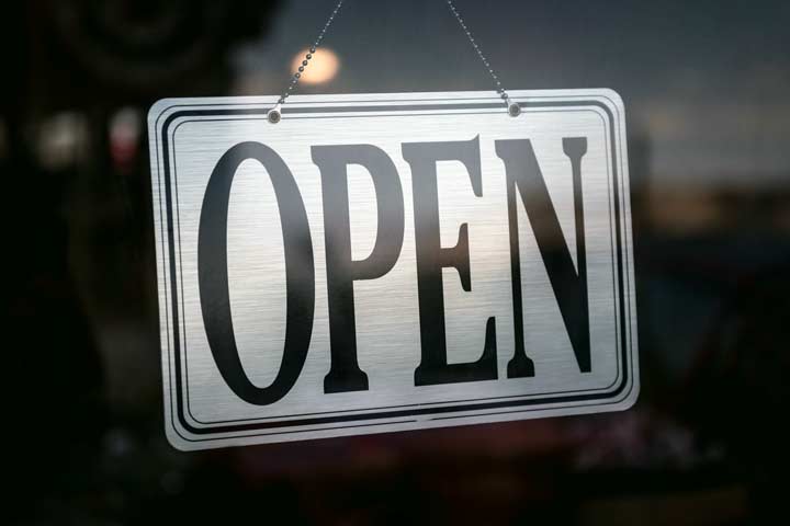 Open sign on a business window