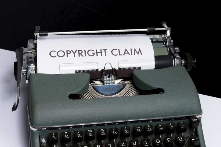 Typewriter printing "copyright claim"